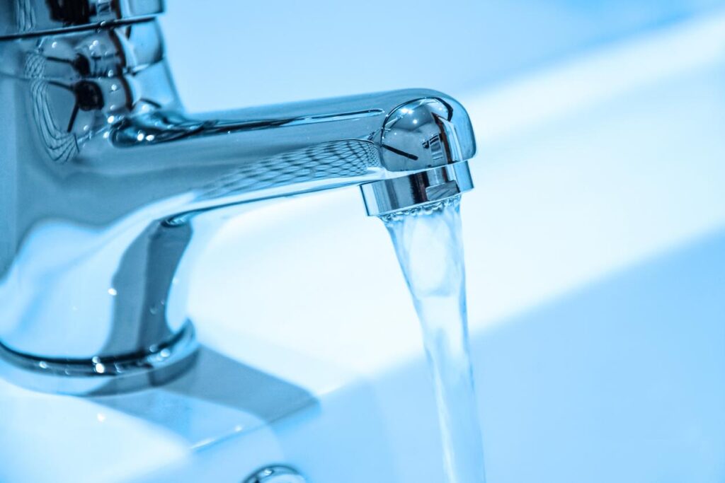 Water running from a faucet.